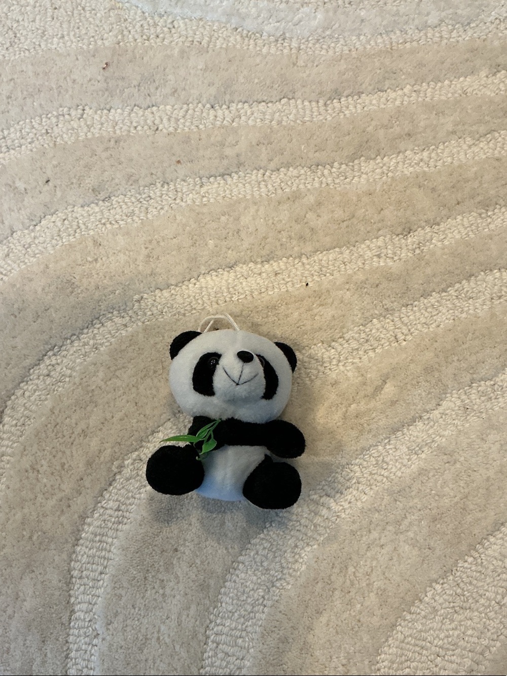 Plush Panda toy with Green Leaf Accent